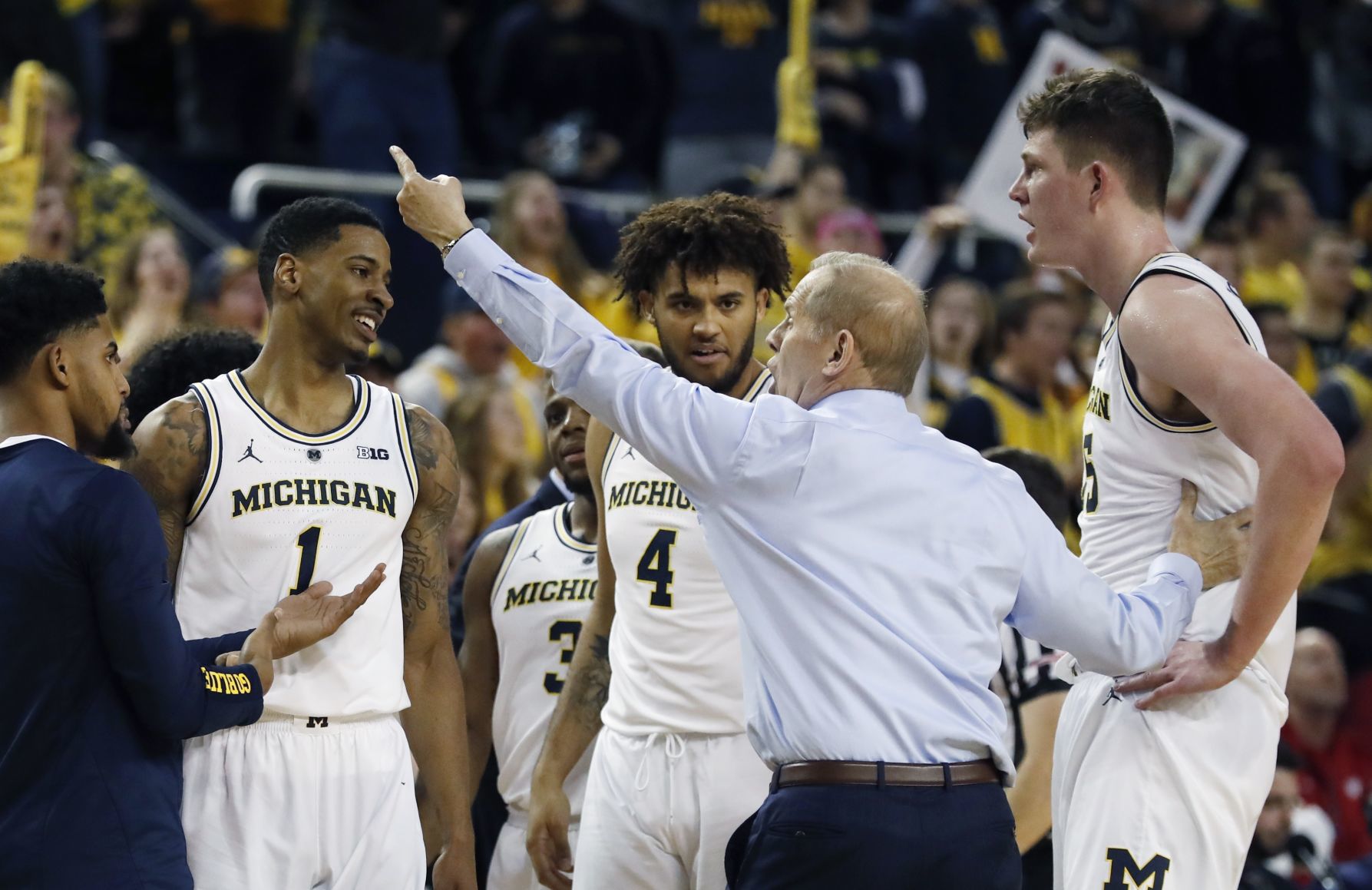 No. 7 Wolverines 61, No. 19 Badgers 52